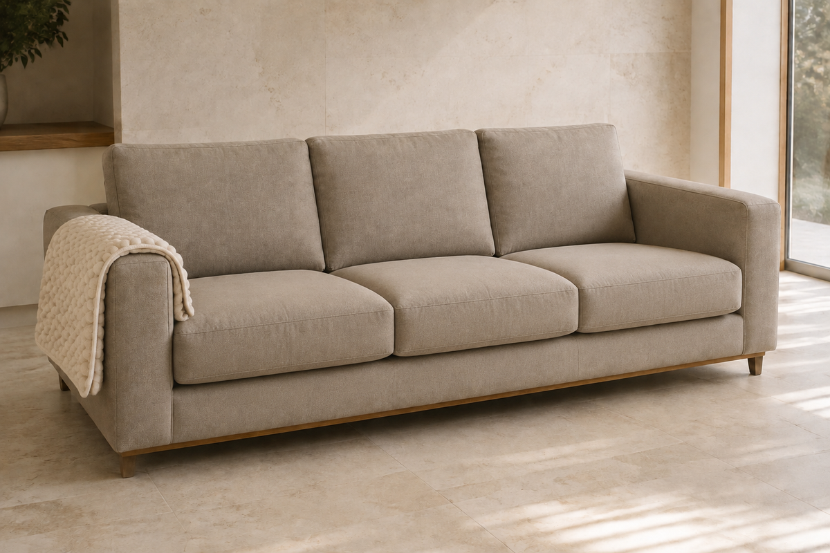 One Beige armrest panel styled over a sofa arm